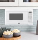 0.7 Cu. Ft. Spacemaker Countertop Microwave Oven view 3