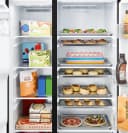 GE® 27.9 Cu. Ft. Side-By-Side Refrigerator with Extra Tall Dispenser and In-Door Icemaker view 9