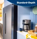 GE® 27.7 Cu. Ft. Side-By-Side Refrigerator with LED Light Walls and Extra Tall Dispenser view 26