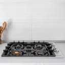 30" Dropin Gas Stovetop with 4 Gas Brass Burners and Black Porcelain Top (RC30-PBT) view 6