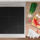Autograph Edition 30 In. 4.2 Cu. Ft. Paramount Induction Range With 4 Element Cooktop And Electric Convection Oven In Satin Stainless Steel With White Matte Door And Matte Black Accents view 5